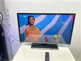 (15) Flatscreen tv Jvc met afstandsbediening