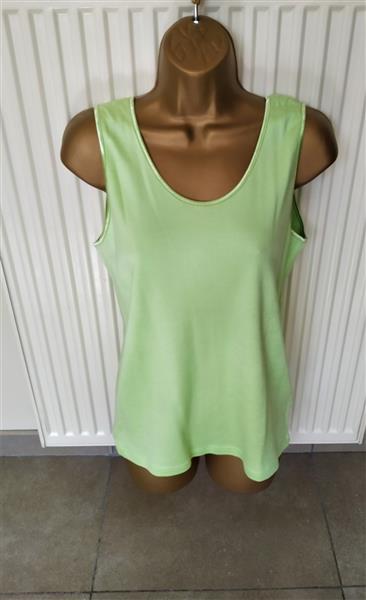 Grote foto elegante mouwloze top in warm pistachegroen kleding dames tops