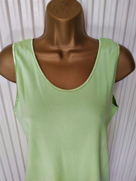 Grote foto elegante mouwloze top in warm pistachegroen kleding dames tops