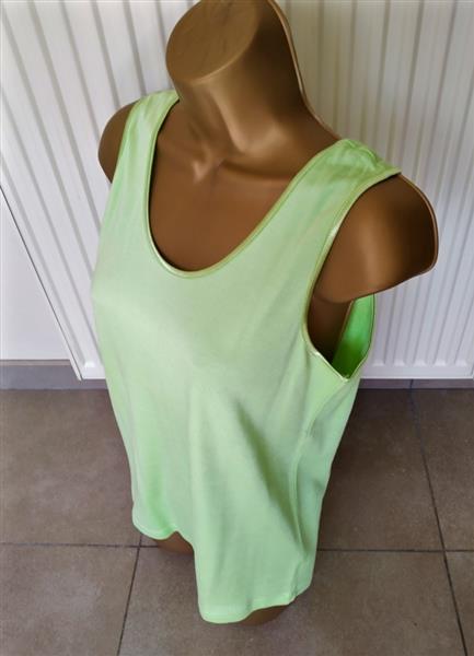 Grote foto elegante mouwloze top in warm pistachegroen kleding dames tops